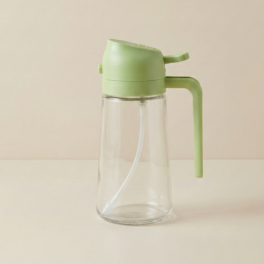 Clear glass bottle with a green lid and handle on a beige background